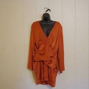 Orange long sleeve, plunging neckline dress
